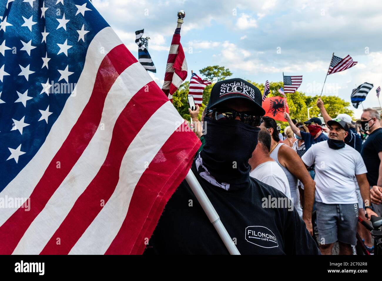 Why is the red and black flag, seen at rallies in support of