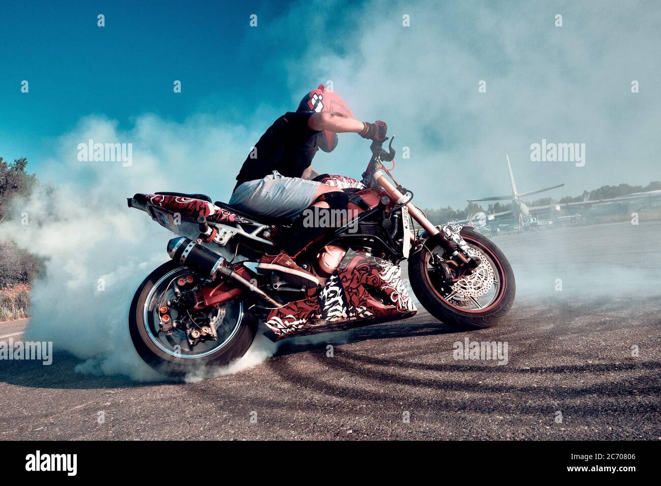 Moscow, Russia - 13 Jul 2020: Moto rider making a wheels burn on his  motorbike. Stunt motorcycle rider performing motorcycle show. Motorcyclist  making Stock Photo - Alamy