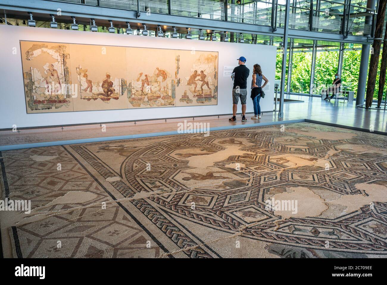 Saint-Romain-en-Gal France, 11 July 2020 : Tourists and ancient Roman mosaic in the museum and archeological Gallo-Roman site of Saint Romain en Gal V Stock Photo