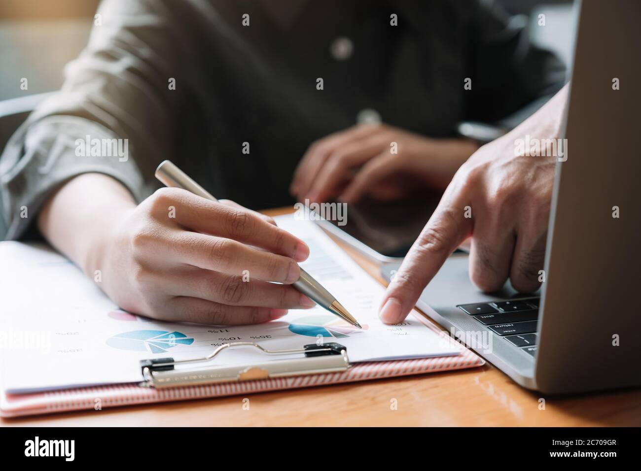 Close up Business meeting and discussing for finance, tax, accounting, statistics and analytic research concept Stock Photo