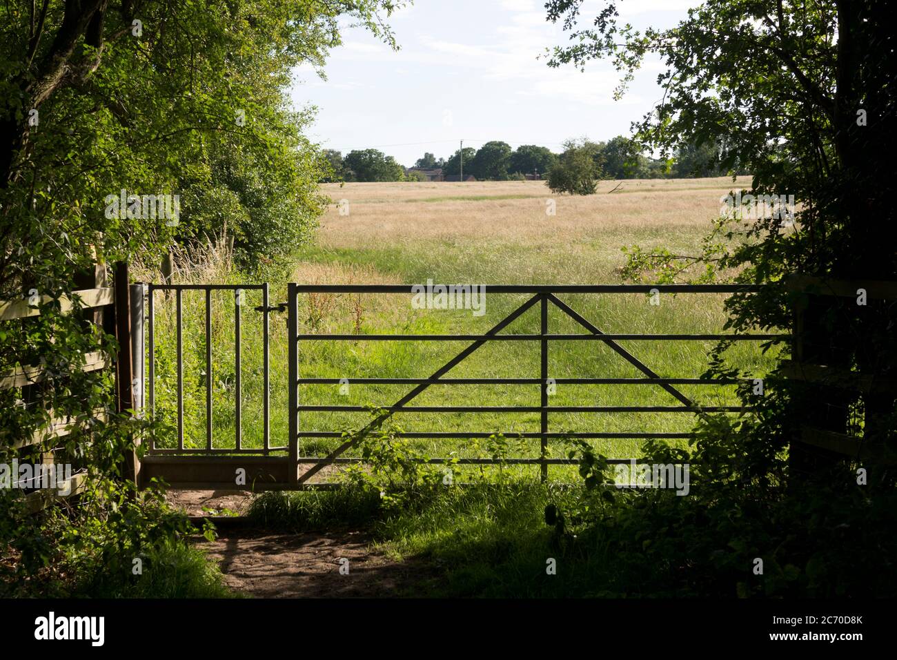 Metal gates on a public footpath in Warwickshire countryside, UK Stock Photo