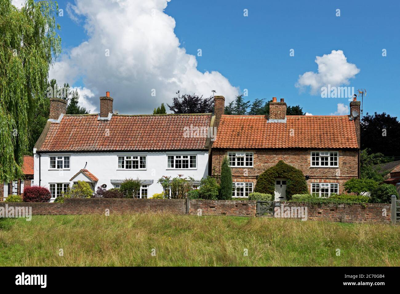 Houses in the village of Nun Monkton, North Yorkshire, England UK Stock