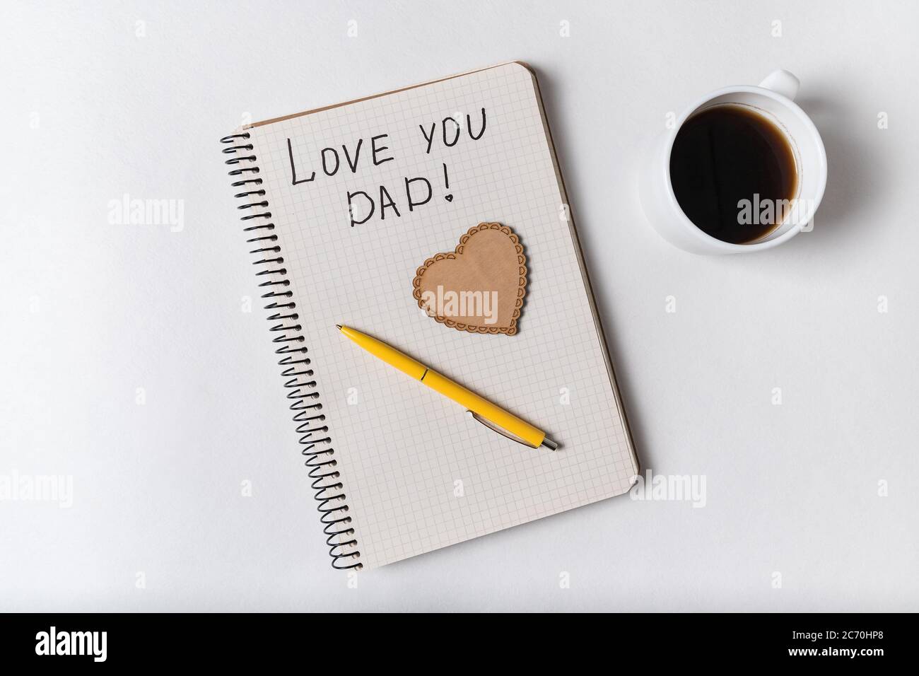 Notice I love dad in Notepad on a white background. Words handwritten.  father's day Stock Photo - Alamy, image size:1300x956