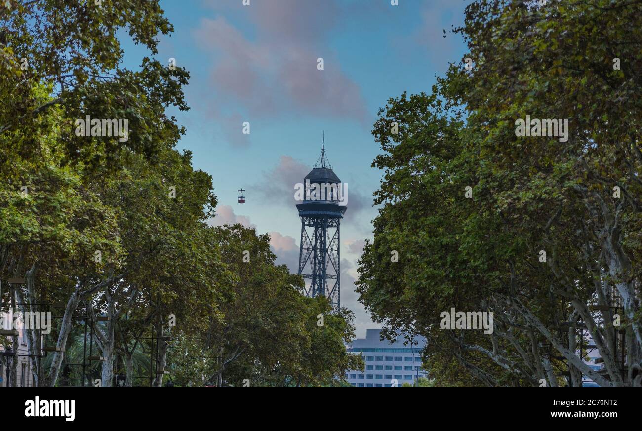 Barcelona Cable Car Through Trees at Dawn Stock Photo - Alamy