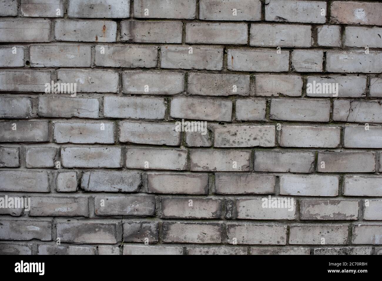 Grey Brick wall. background and texture. The brick wall is gray. Stock Photo