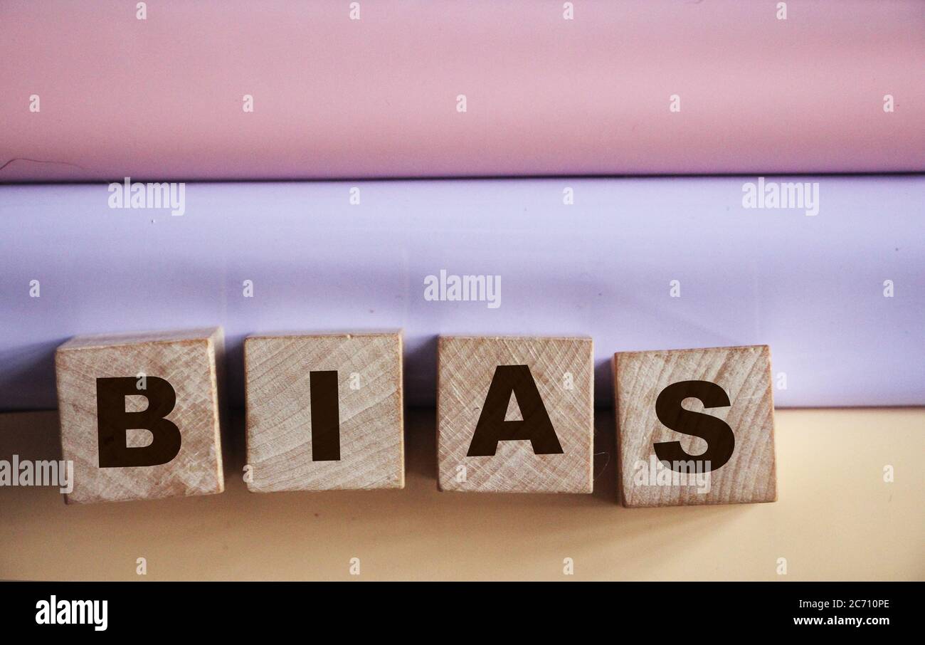 Bias word from wooden blocks, personal opinions prejudice bias concept Stock Photo