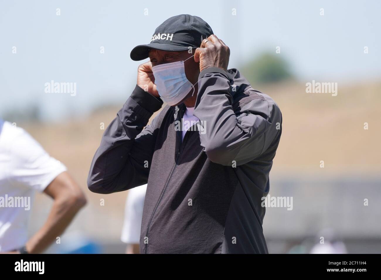 Al Joyner wears a face mask during the Zurich Weltklasse Inspiration