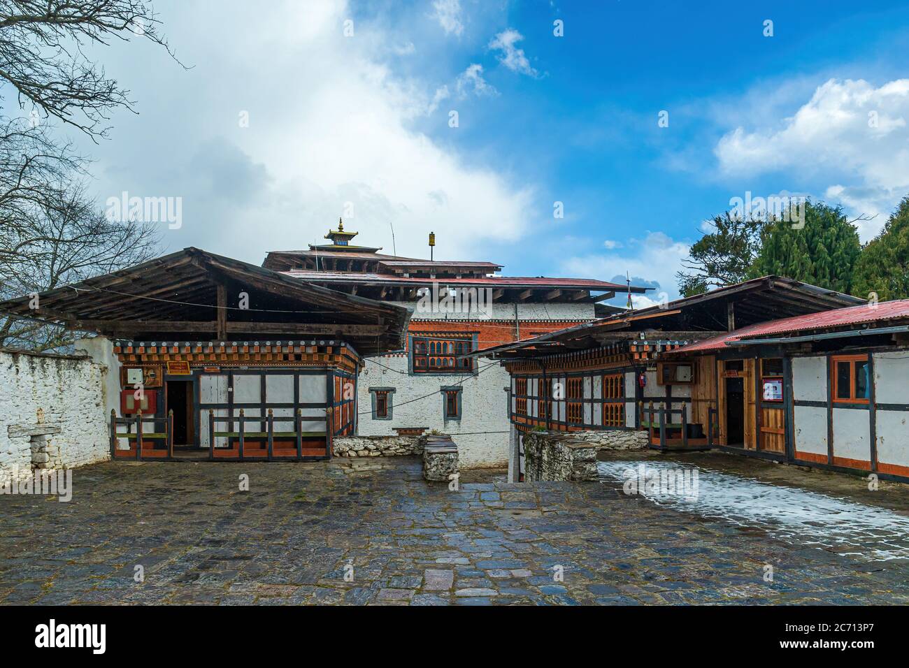 Snow falling at a tiny Dzong in Bhutan Stock Photo