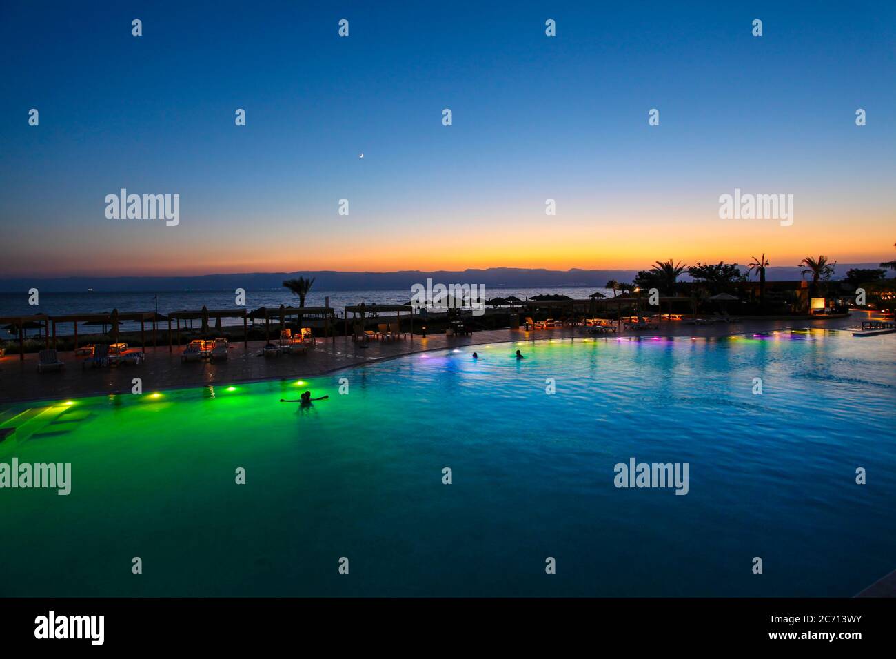 Jordan, Aqaba, Tala Bay Luxury Beach Resort. at sunset Stock Photo