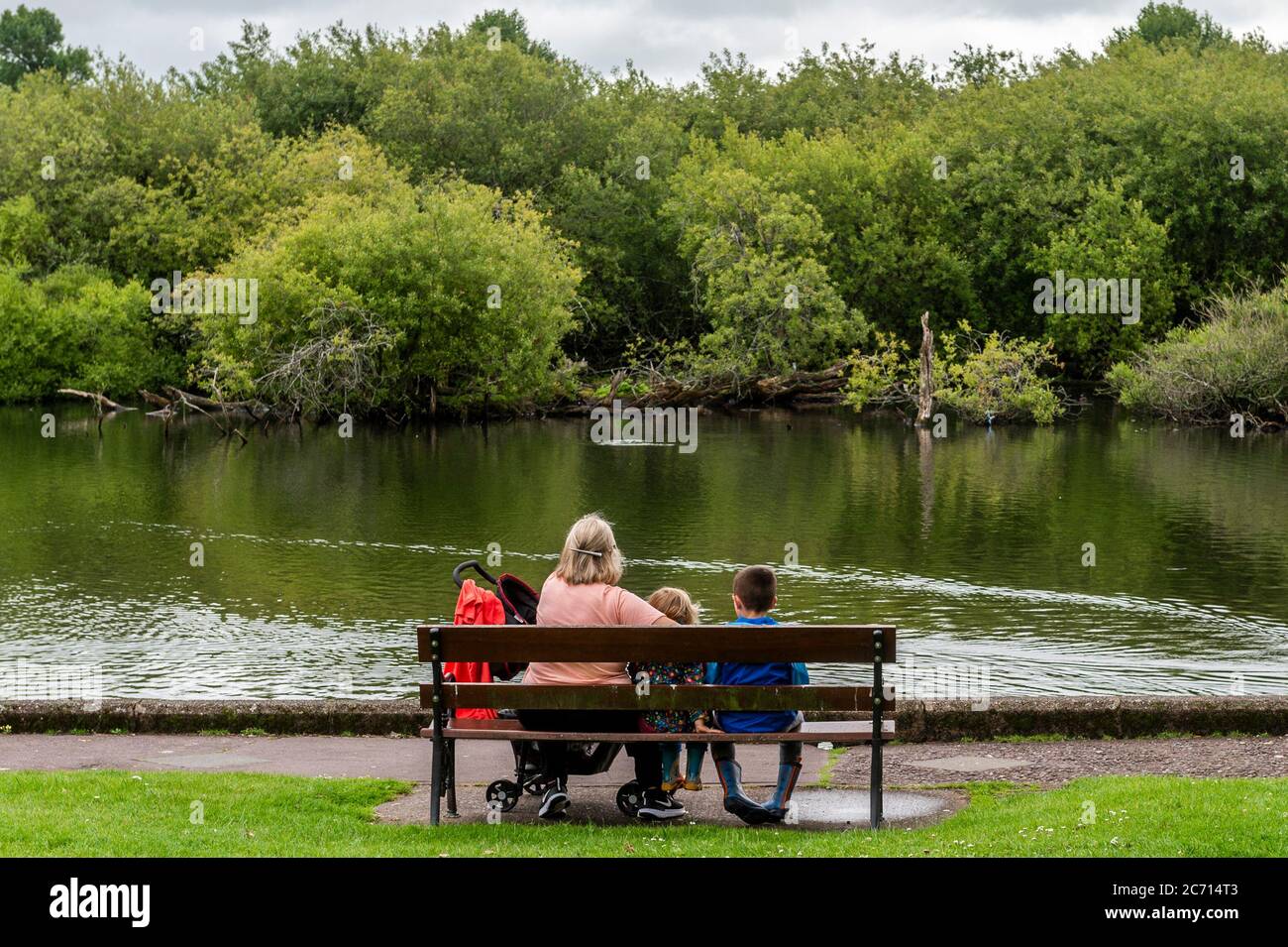 The Lough, Cork, Ireland. 13th July, 2020. People enjoy The Lough, Cork