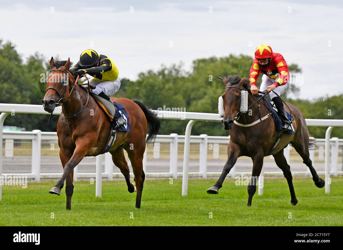 Alijady ridden by Charles Bishop win the Visit attheraces.com Handicap at Windsor Racecourse. Stock Photo