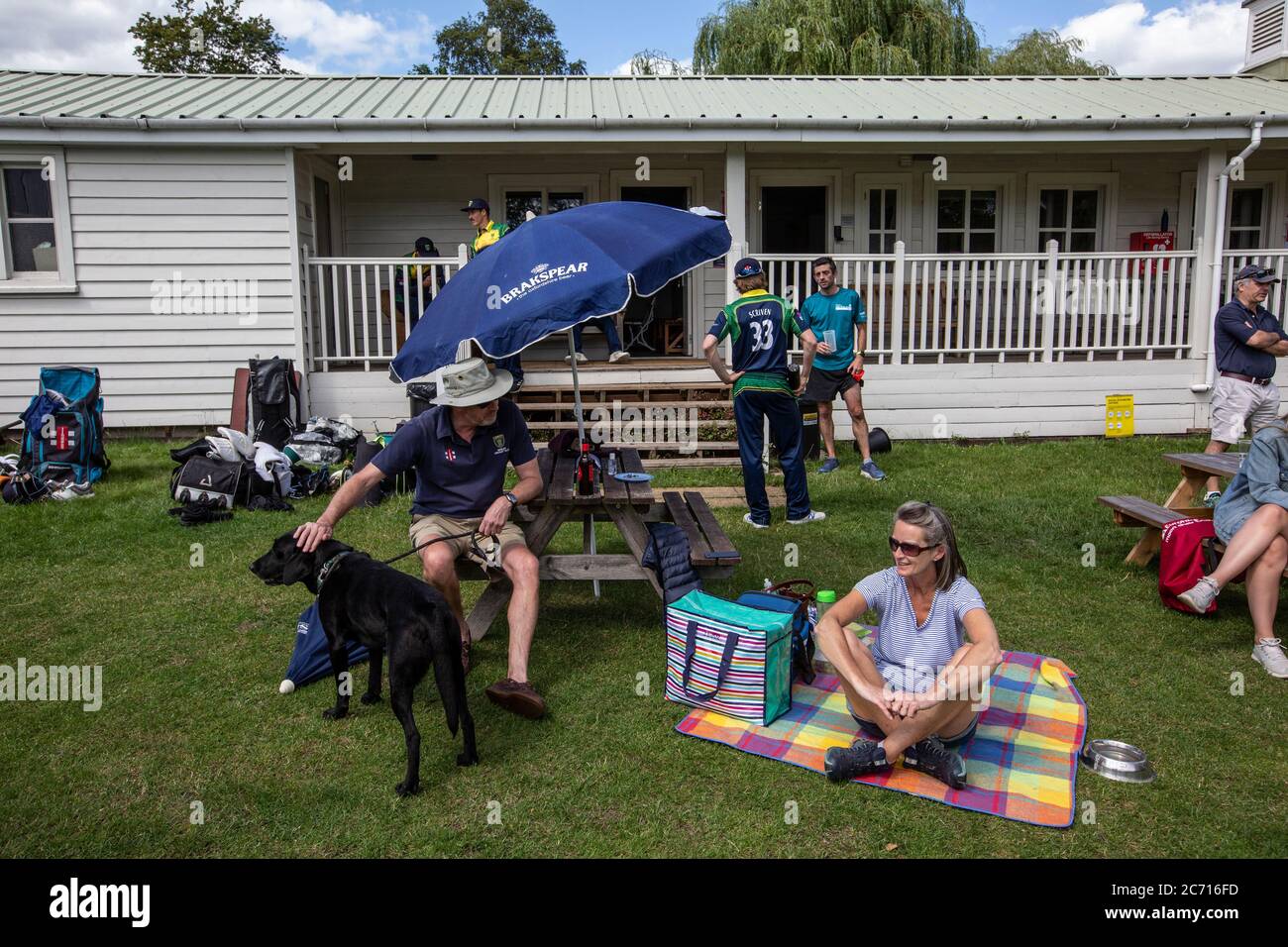 Spectators return to Henley Cricket Club to watch their local club cricketers play Wargrave as the season begins after the coronavirus lockdown, UK Stock Photo