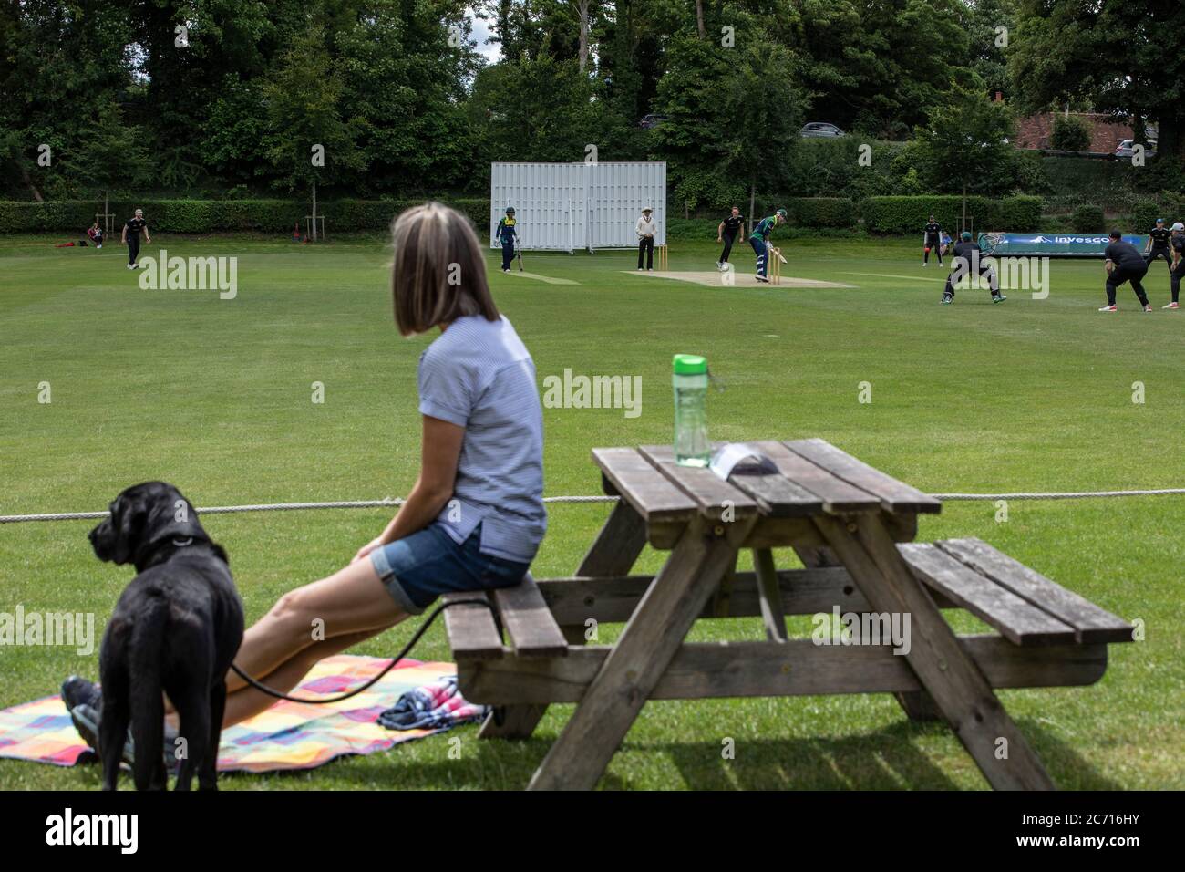 Spectators return to Henley Cricket Club to watch their local club cricketers play Wargrave as the season begins after the coronavirus lockdown, UK Stock Photo