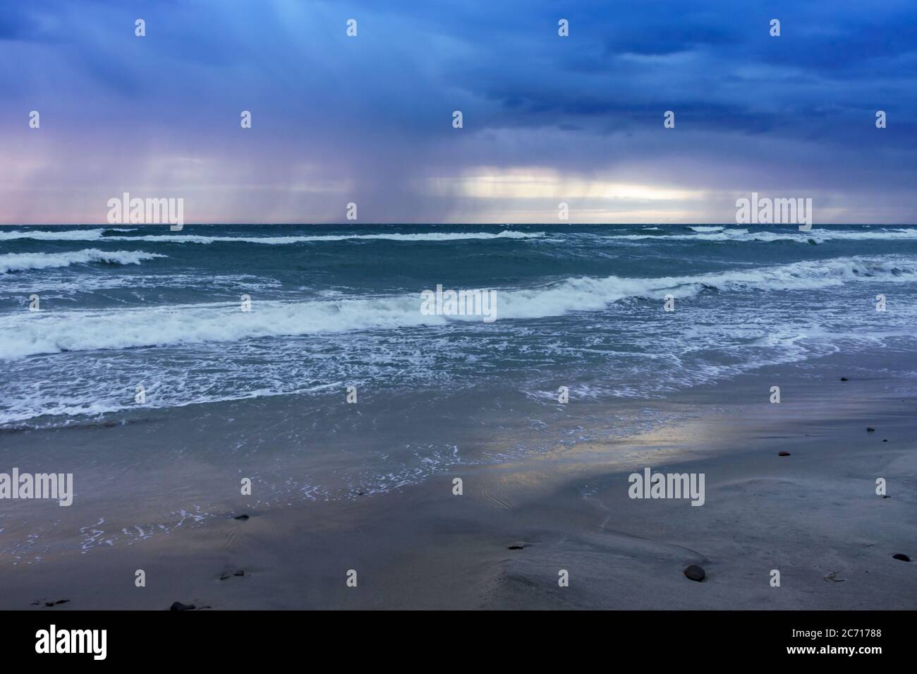Blue sea waves sunset storm hi-res stock photography and images - Alamy