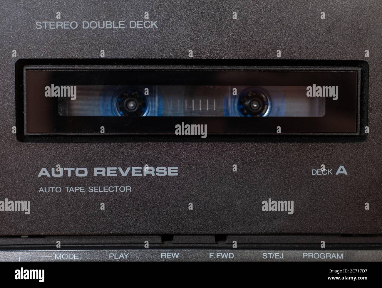 Close up front a deck recorder of the vintage stereo cassette tape