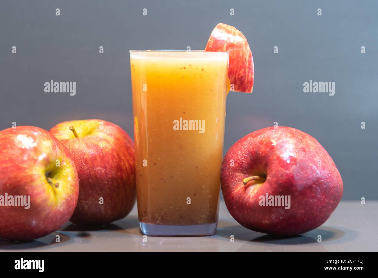 Apple juice. The apple is a relatively common fruit that has many health benefits from controlling diabetes to improving digestion. Also consumed fre Stock Photo Alamy