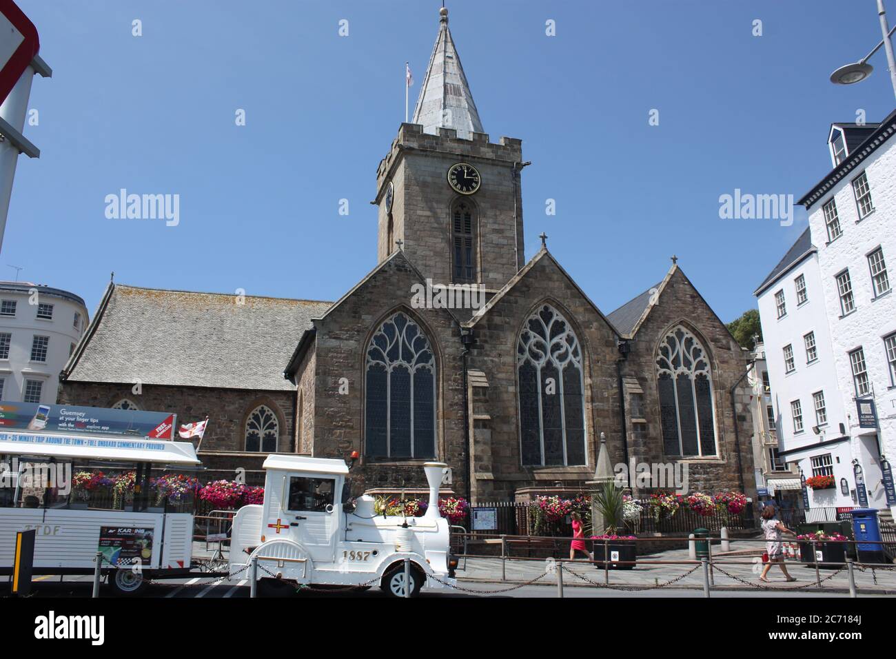 Channel Islands. Guernsey. St Peter Port. Town Church with passing