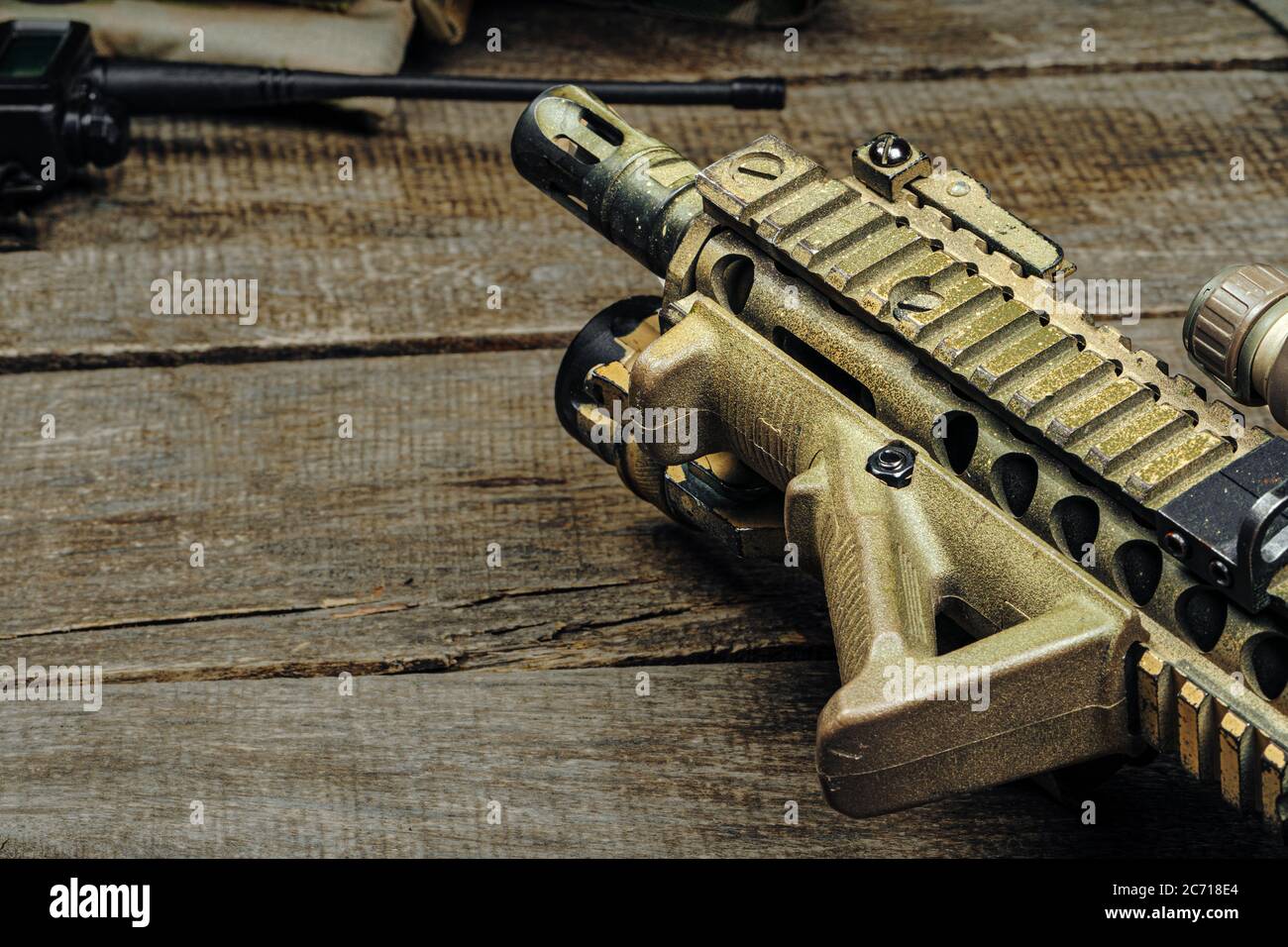 Close up photo of M16 rifle on wooden board Stock Photo
