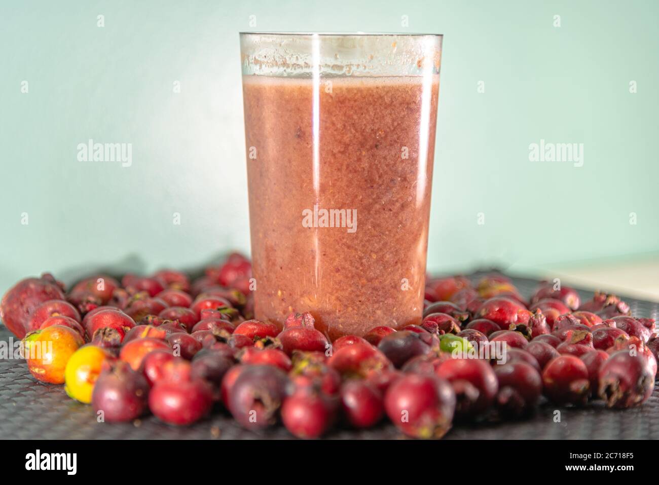 Araçá Rosa Juice (Psidium cattleianum). Red fruits. Brazilian fruit drink.  Natural drink rich in vitamin c. Exotic drink. Natural food and detox diet  Stock Photo - Alamy