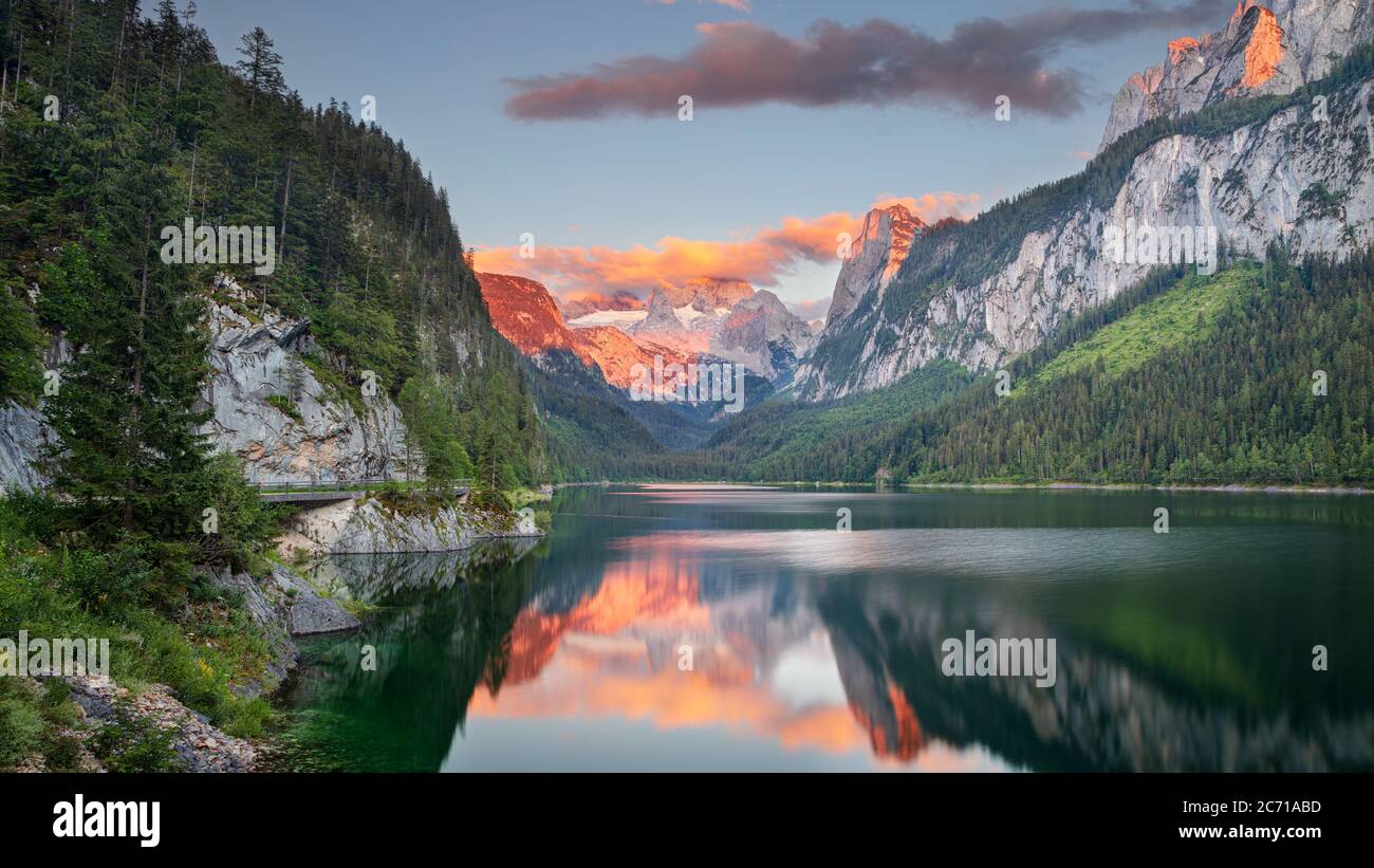 Gosausee, European Alps. Panoramic image of Gosausee, Austria located in European Alps at summer sunset. Stock Photo