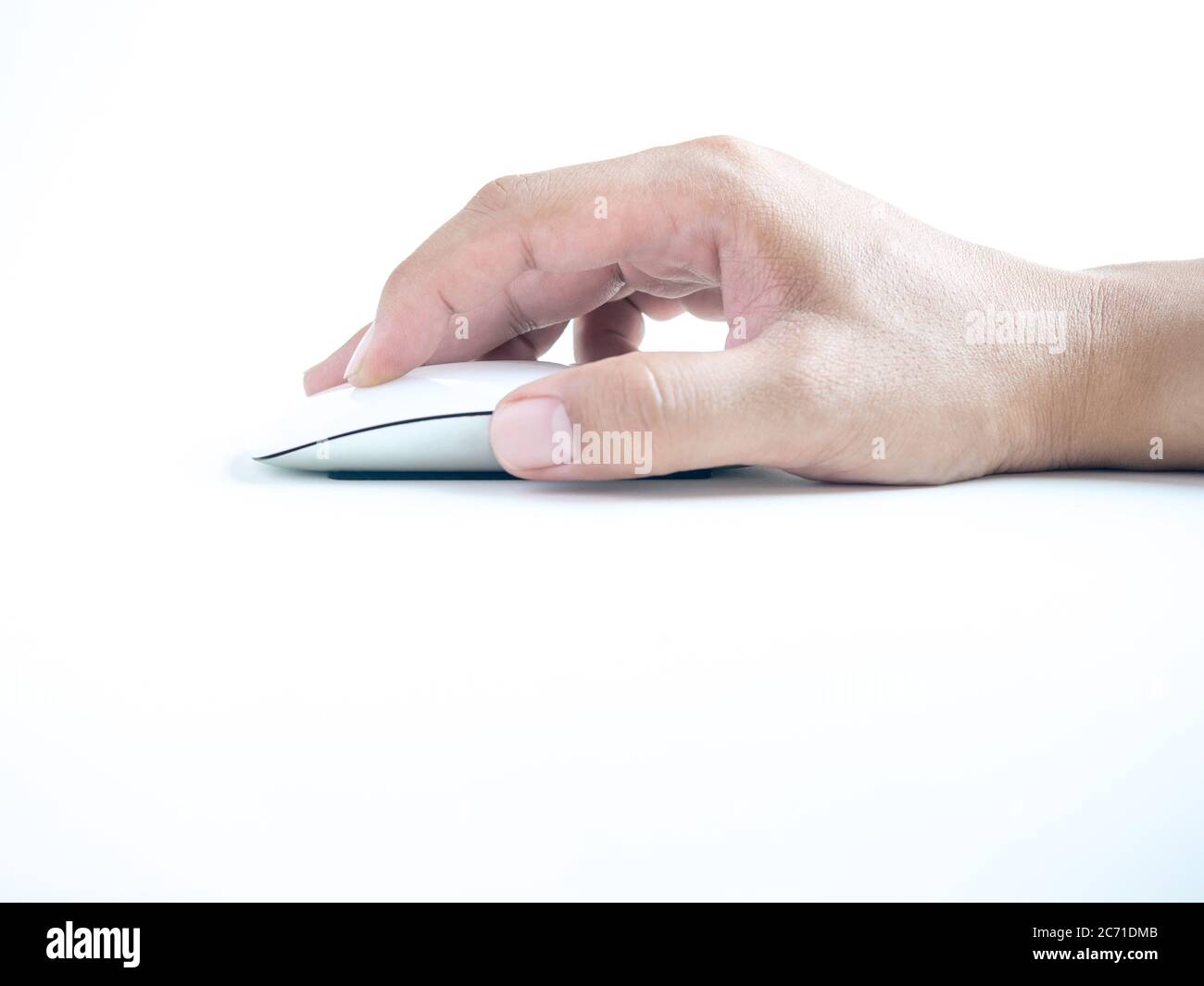 Hand using computer mouse. Finger clicking on white modern mouse