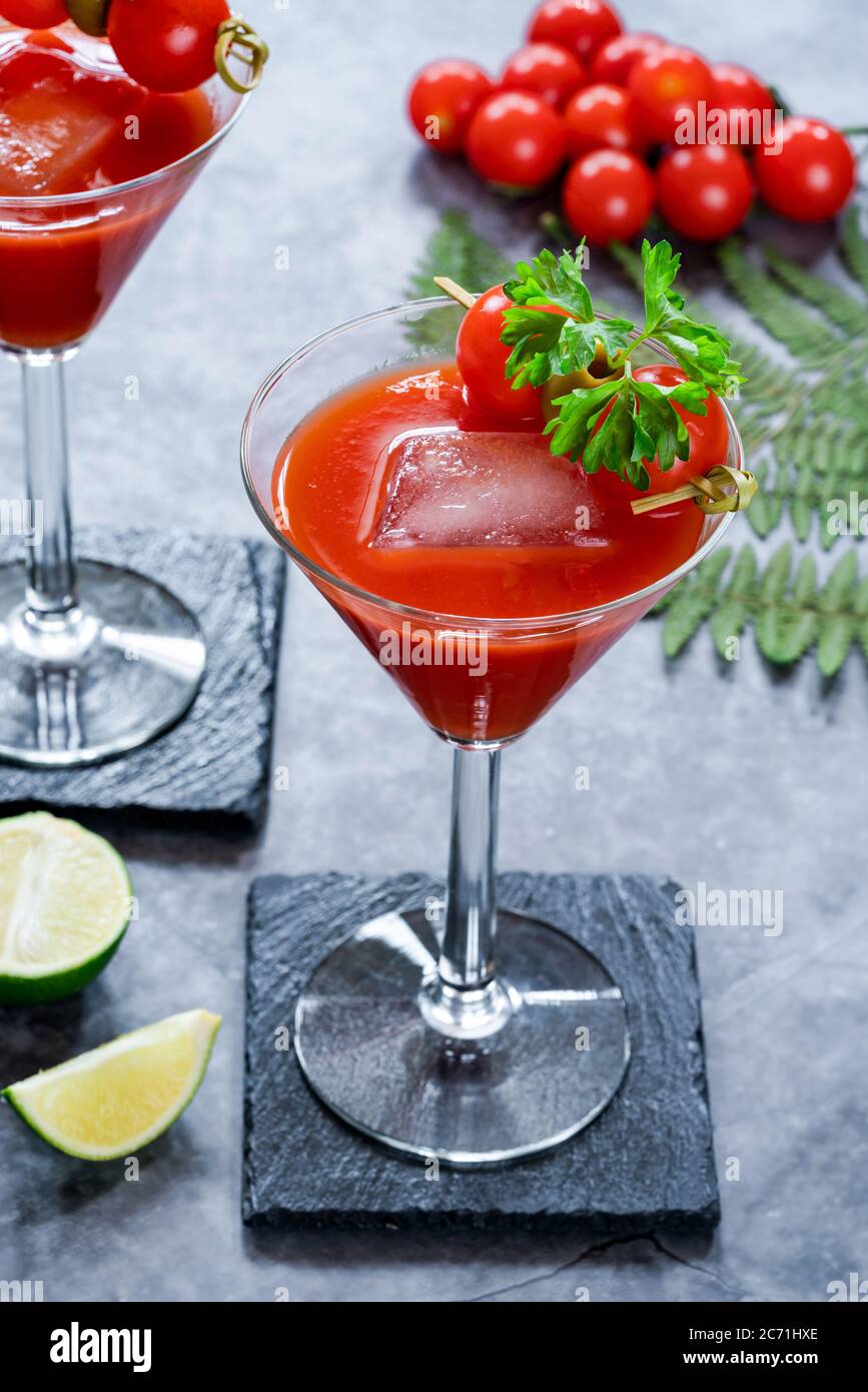 Bloody Mary cocktail with vodka and tomato juice with garnishes