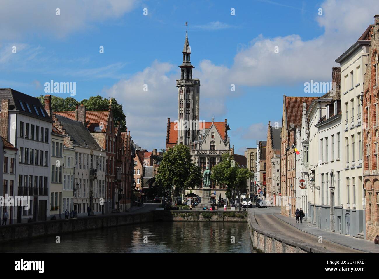 Poortersloge, Bruges, Belgium, as seen from the Bridge over the Spiegelrei Canal in Summer 2019: Bruges was a centre of early capitalism. Stock Photo