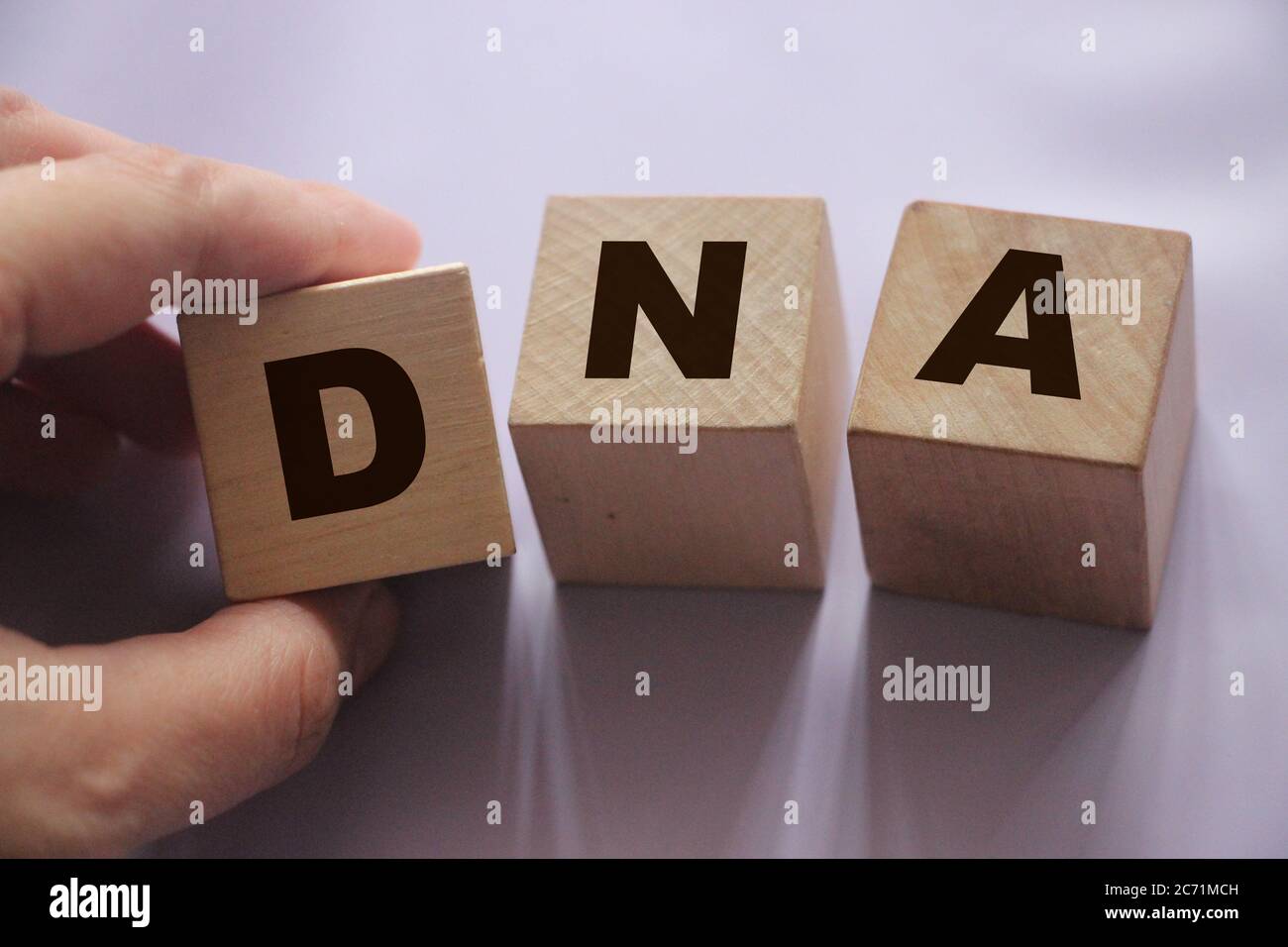 DNA abbreviation on wooden Building Blocks. Genetics concept Stock Photo