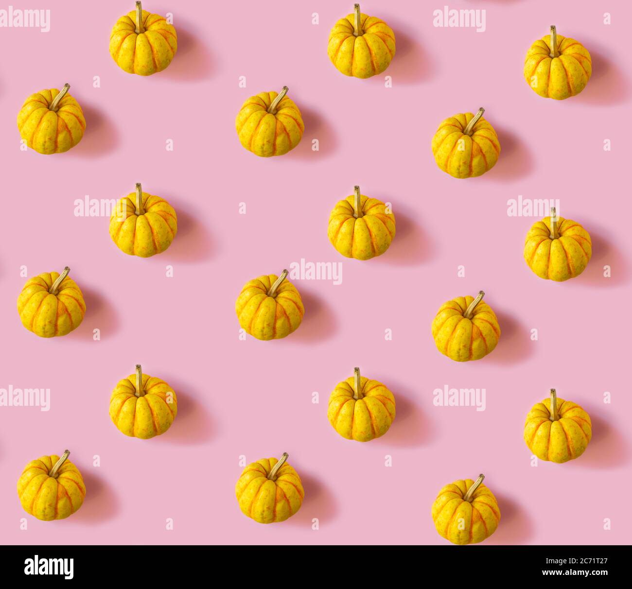 Seamless pattern with pumpkins on a pink background Stock Photo