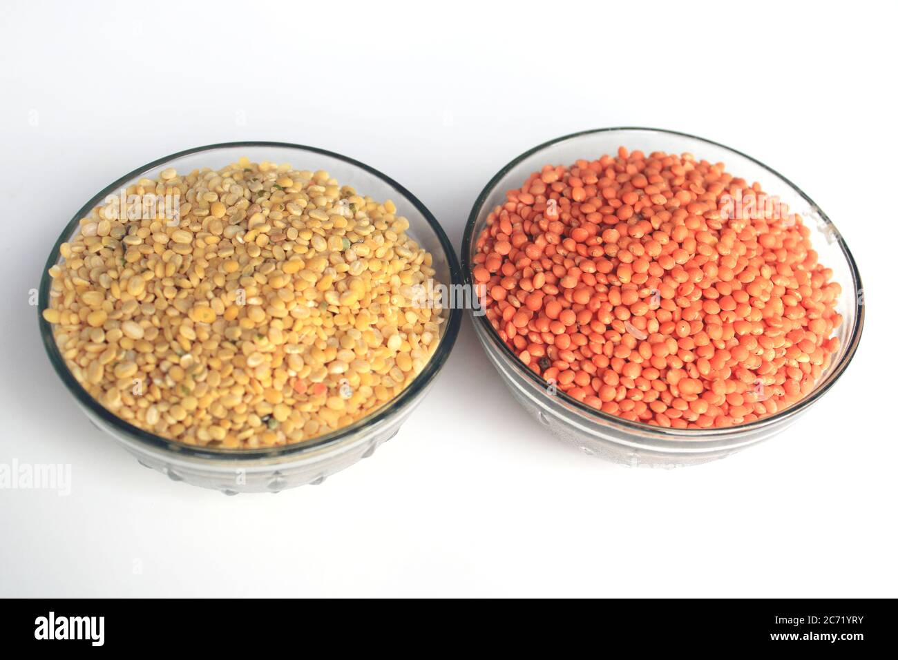 Pile of uncooked red lentils and pigeon pea. Mung beans and red lentils