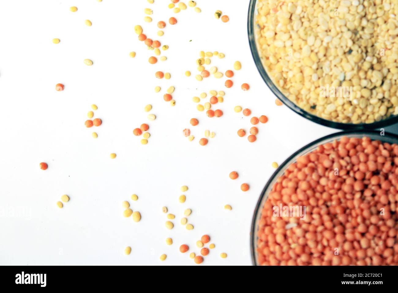 Pile of uncooked red lentils and pigeon pea. Mung beans and red lentils