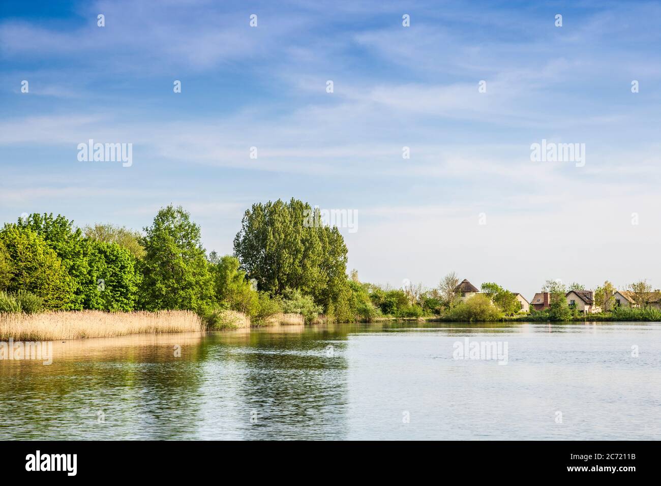 Luxury holiday homes around one of the lakes in the Cotswold Water Park