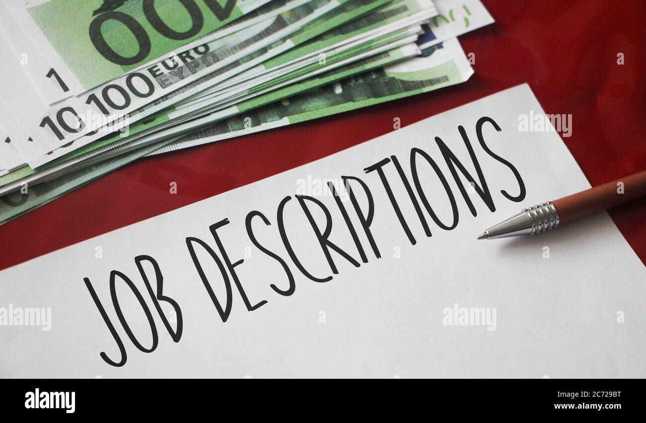 Job Descriptions text, 100 Euro bills. Career development huan resources concept Stock Photo