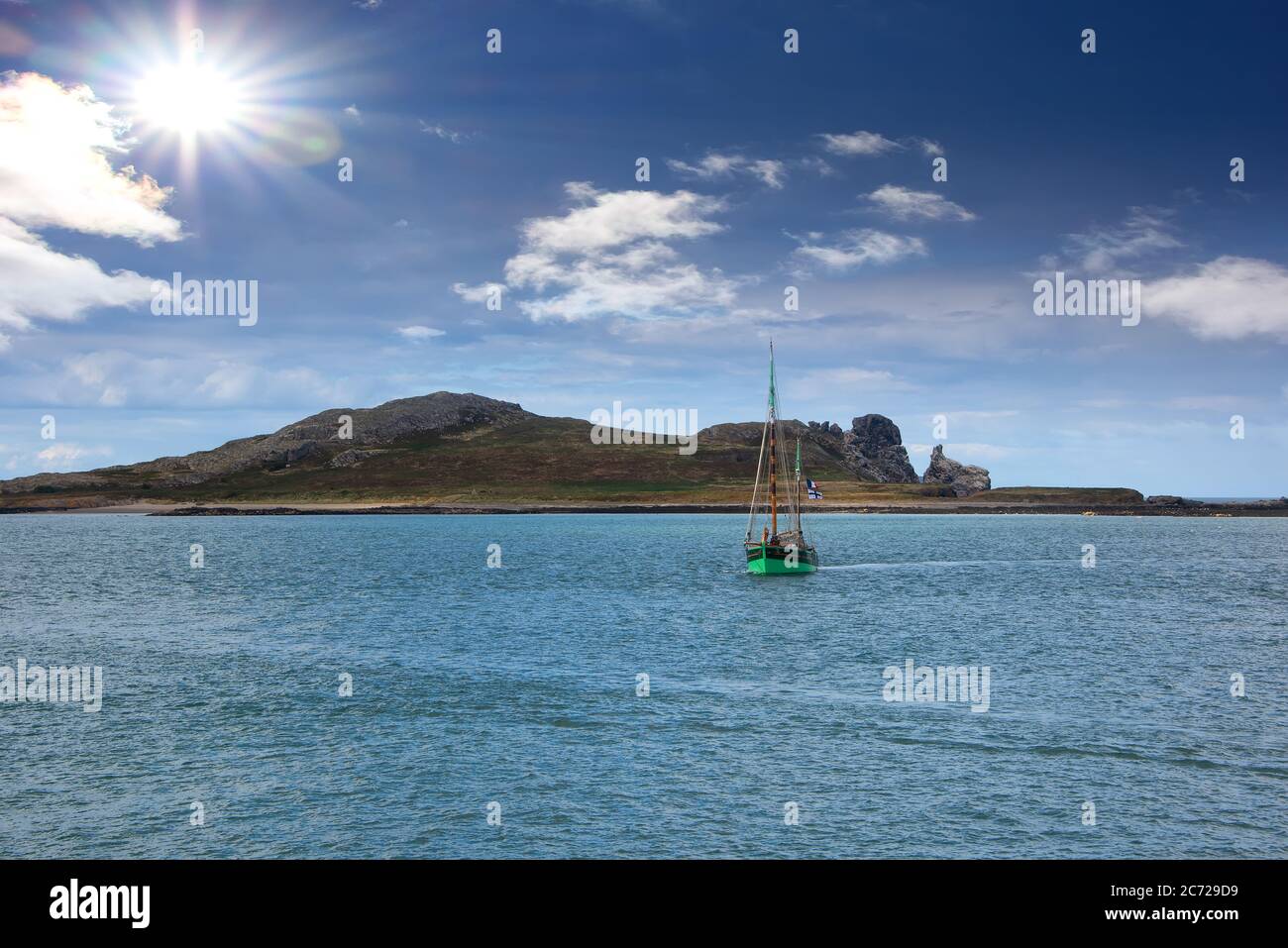 Large boat sailing on the Howth Peninsula near the fishing village of Howth. Stock Photo