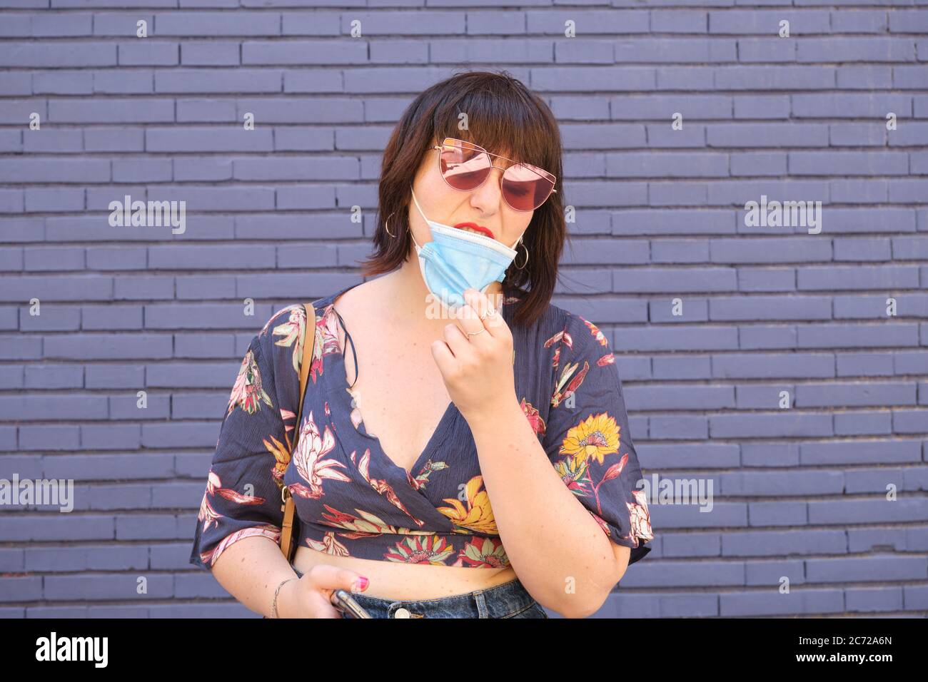 Remove mask hi-res stock photography and images - Alamy