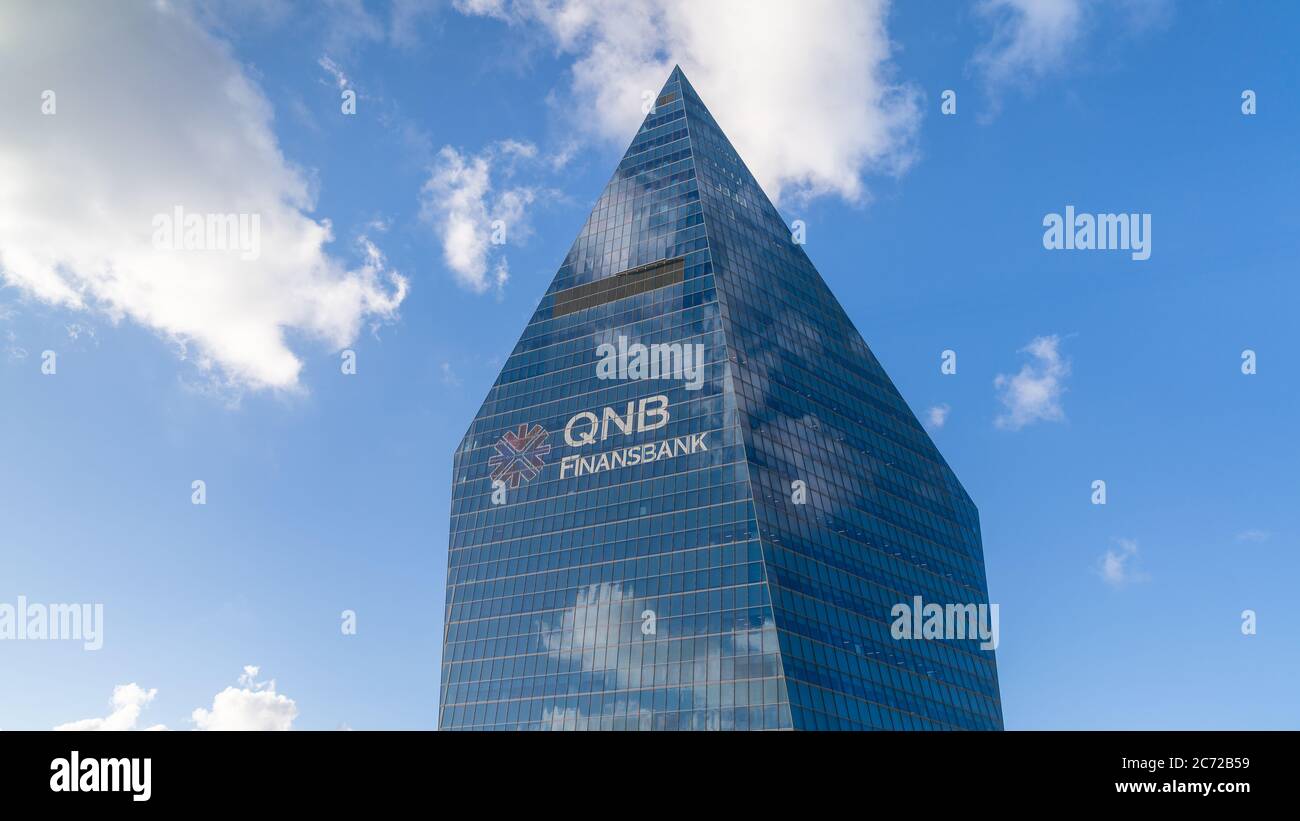 Istanbul Turkey - September 2018: Top floors of QNB Finansbank headquarters tower in Levent, istanbul, Turkey Stock Photo