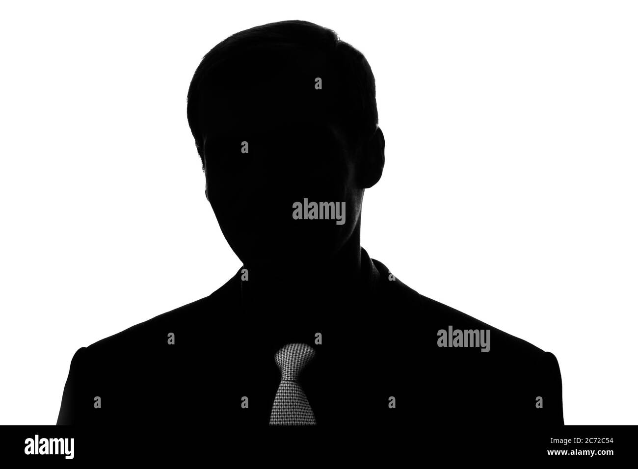 Portrait young man in suit, tie in front view - silhouette Stock Photo