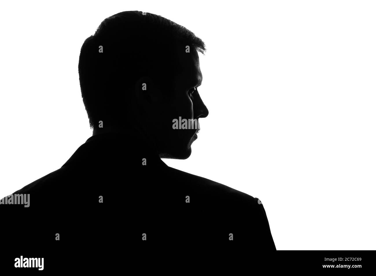 Portrait of a young man, view from the back - silhouette Stock Photo