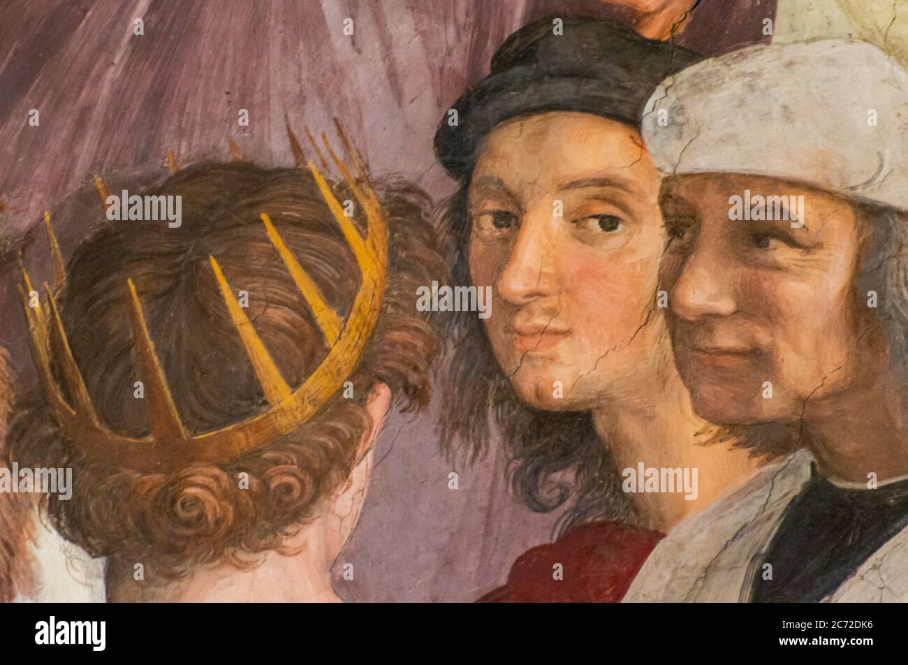 Detail of medieval painting showing the faces of two men who talk to a king wearing a crown Stock Photo