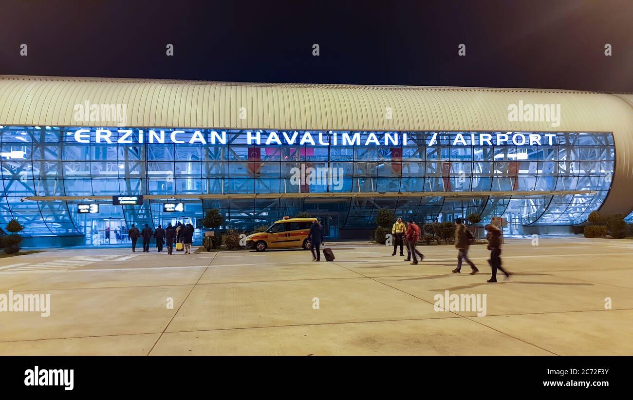 Erzincan, Turkey - October 2018: Erzincan airport at night with unidentified passengers walking Stock Photo