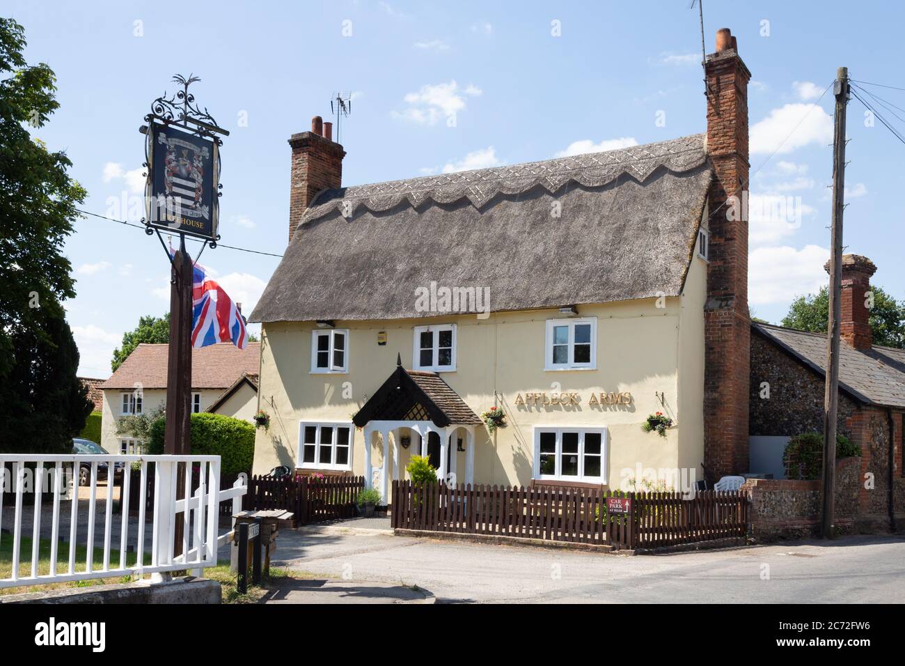 The Affleck Arms, an English Village country pub in the Suffolk village of Dalham on a sunny day in summer; Dalham Suffolk UK Stock Photo