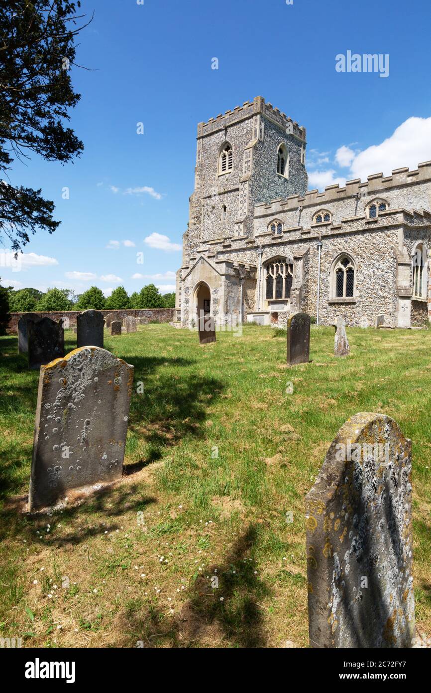 English village church; Exterior of the 17th century Church of St Mary the Virgin and churchyard; Dalham village, Suffolk UK Stock Photo