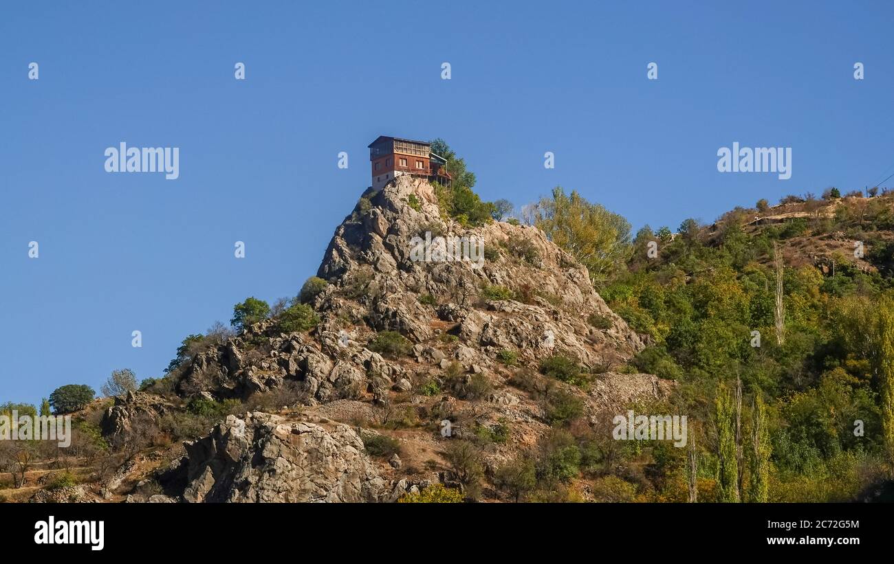 Kemaliye, Turkey - October 2018: Famous house on the rock in Kemaliye district in Erzincan, Turkey. Stock Photo