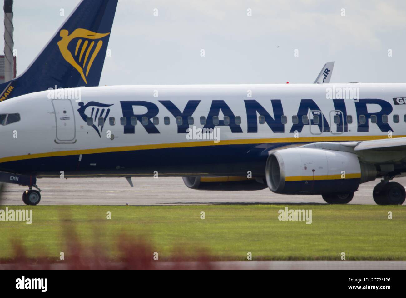Prestwick, Scotland, UK. 13th July, 2020. Pictured: A Ryanair flight (Boeing 737-800) departing Prestwick Airport for a European holiday destination. Ryanair has been operating full schedules since the 1st July due to the coronavirus (COVID19) crisis which has affected the global aviation industry. Passengers are required to wear face masks on their flights until further notice to help prevent the spread of coronavirus. Credit: Colin Fisher/Alamy Live News Stock Photo
