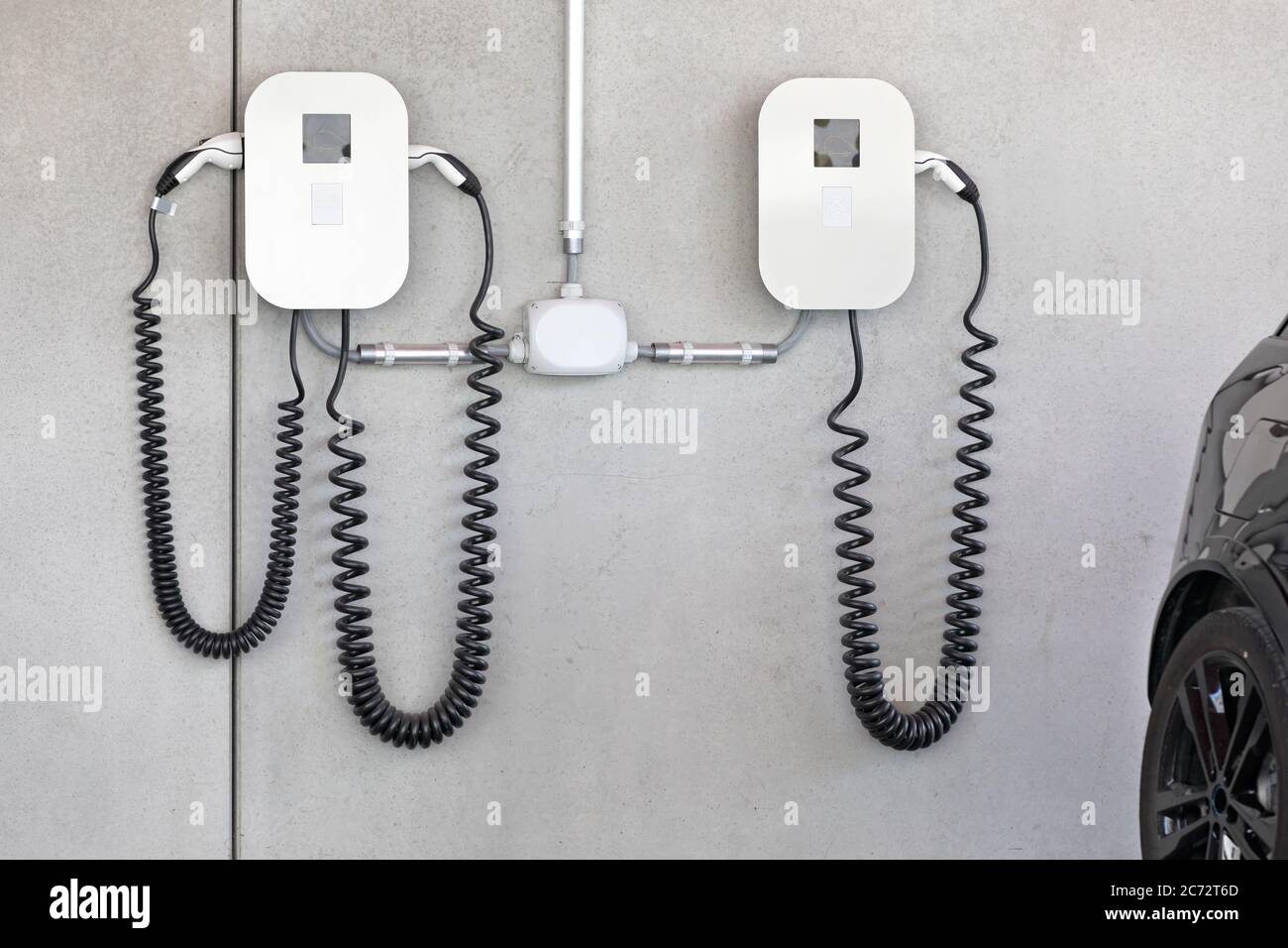 car charger with cable on concrete wall Stock Photo