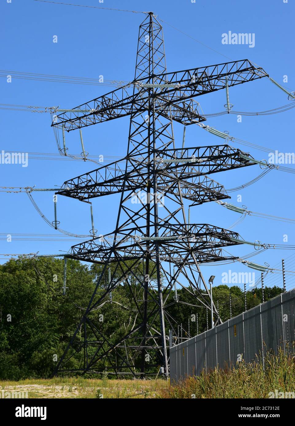 An electricity plyon near Ninfield Substation in Sussex, England, UK. Stock Photo