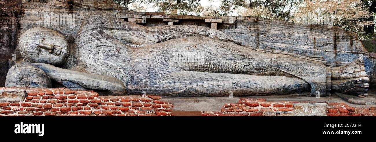 Sri Lanka travel and landmarks -  ancient city of Polonnaruwa, UNESCO World Heritage Site. Buddha statue carved in the rock Stock Photo