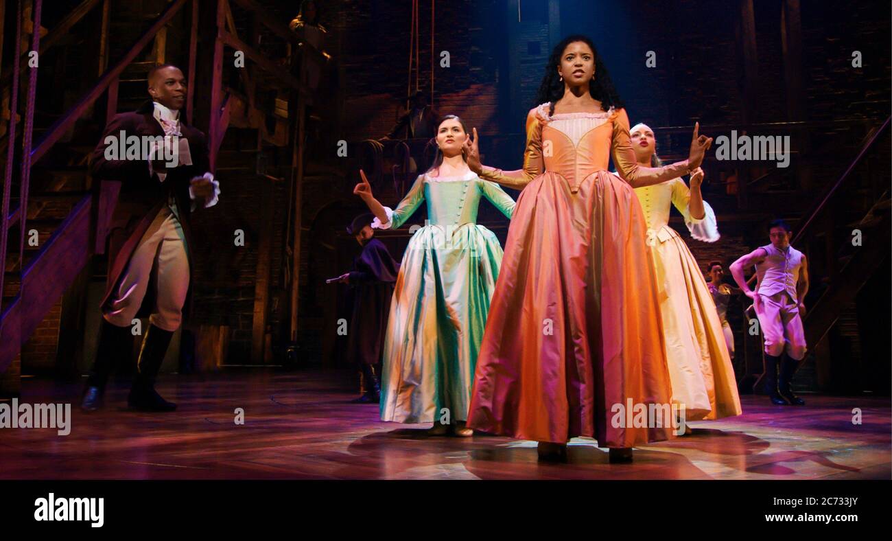 HAMILTON, foreground from left Leslie Odom Jr. as Aaron Burr, Phillipa