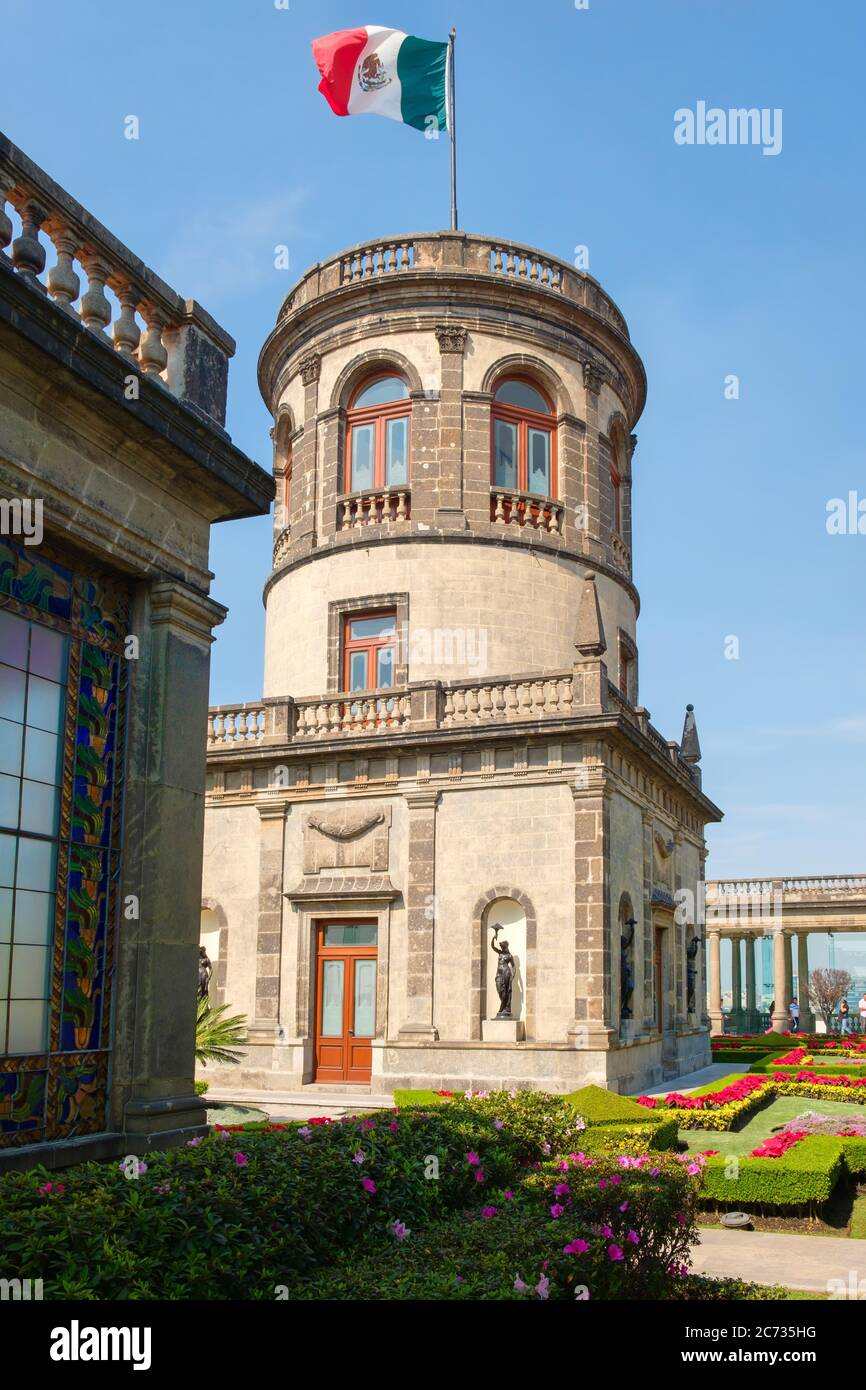 Beautiful gardens and tower with the mexican flag at the alcazar at Chapultepec Castle in Mexico City Stock Photo
