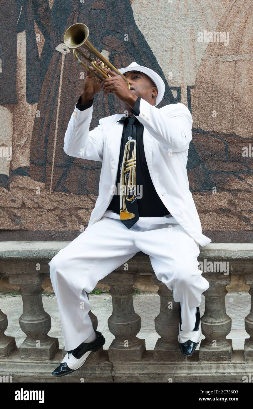 Black cuban musician playing the trumpet in Havana Stock Photo